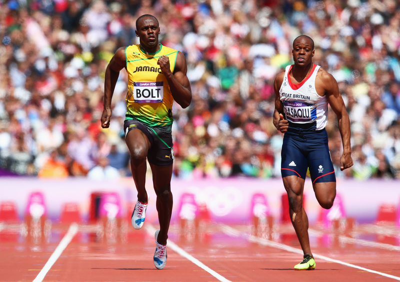 Illustration for article titled Photos Of Usain Bolt Looking Bored As He Blows Past The Best Runners In The World
